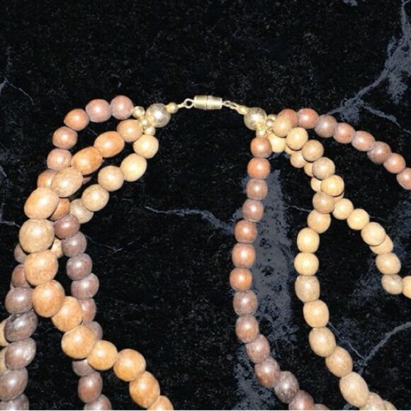 Elegant Brown Wooden Beaded Necklace with Carved Mother of Pearl Leaf Pendant - Picture 6 of 11